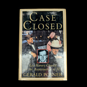 The cover of the book 'Case Closed, Signed by Gerald Posner, 1993' featuring an illustration related to the assassination of JFK with a signature on the front.