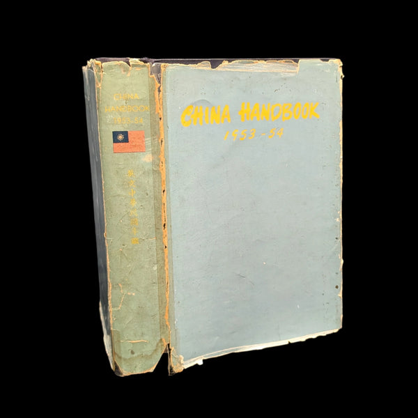 A worn hardcover book titled 'China Handbook, China Yearbook, 1953-1954' with a green and yellow cover.