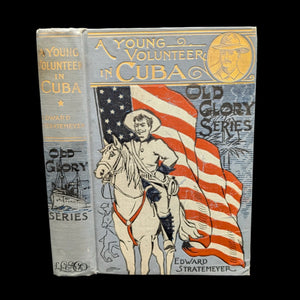 Cover of the book 'A Young Volunteer in Cuba, or, Fighting For The Single Star, 1898' featuring an illustration of a man on horseback with a flag.