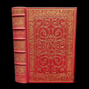 A red leather bound book with gold embossed decorations, titled 'William Shakespeare Comedies, The Franklin Library, 1978'.