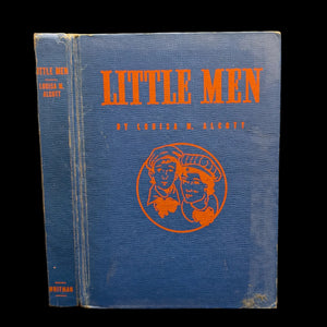 A hardcover book titled 'Little Men' by Louisa M. Alcott with a blue cover and orange text.