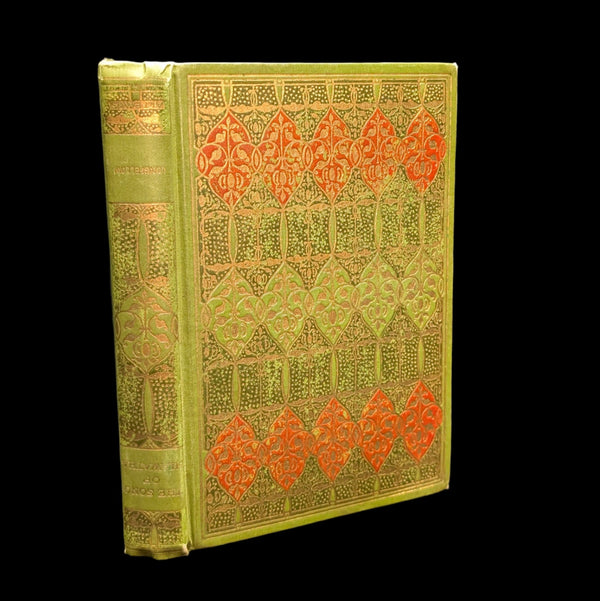 An 1898 edition of 'The Song of Hiawatha' by Henry Wadsworth Longfellow with decorative gold and red embossing on the cover.