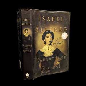 A book cover of 'Daughter Of Fortune' by Isabel Allende, featuring an image of a woman with a yellow flower in her hair and the title and author's name at the top.