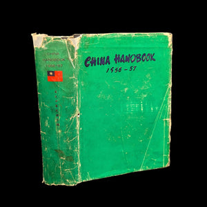 A worn green cover of the 'China Handbook, China Yearbook, 1956-1957' with the title and publisher information printed on the front.