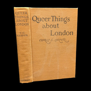 A hardcover book titled 'Queer Things about London' by Charles G. Harper with a gold-colored cover and black text.