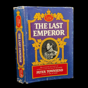 The image shows a hardcover book titled 'The Last Emperor' by Peter Townsend, published in 1976. The book has a blue cover with a gold-colored floral design and the author's name at the top.