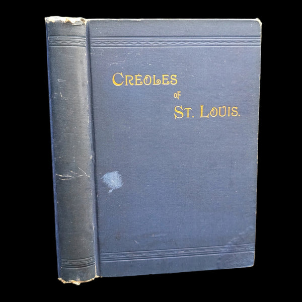 Cover of the book 'Creoles of St. Louis' by Paul Beckwith, showing title and author's name in gold on a dark-colored cover with visible signs of wear.