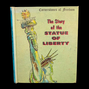 A book cover of 'The Story of the Statue of Liberty' featuring an illustrated depiction of the Statue of Liberty holding a torch.