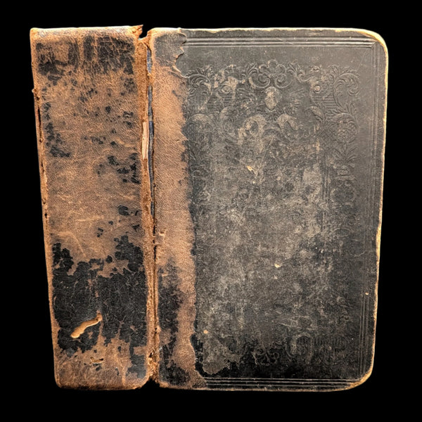An old, worn Swedish Psalm Gospel book withsermon texts from 1878, featuring decorative embossed patterns on the cover.