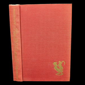 A hardcover book with a red cover and a gold emblem of a chicken on the front. The title 'The Egg And I' is visible on the cover.