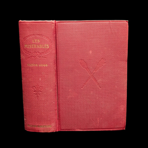 Cover of 'Les Miserables' by Victor Hugo, showing title and author's name, with a red background and crossed out diagonal lines.