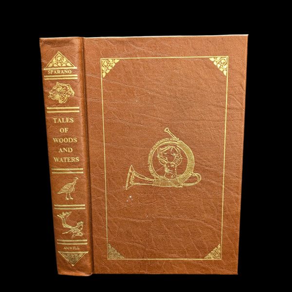 A hardcover edition of 'Tales of Woods and Waters' with gold lettering and decorations on the cover.