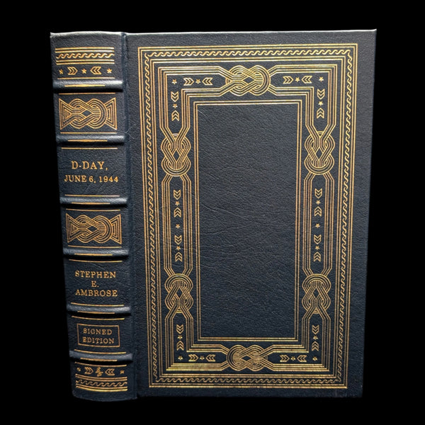 Leather-bound collector's edition book titled 'D-Day June 6, 1944' by Stephen E. Ambrose, featuring gold embossed decorations on the cover.