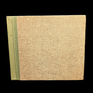 Hardcover edition of 'The Connoisseur's Handbook of Marijuana' by William Daniel Drake Jr. The book has a green spine and a beige cover with visible wear.