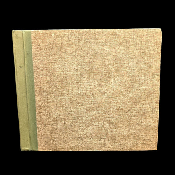 Hardcover edition of 'The Connoisseur's Handbook of Marijuana' by William Daniel Drake Jr. The book has a green spine and a beige cover with visible wear.