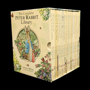 The Complete Peter Rabbit Library book collection in a box, featuring illustrations of Peter Rabbit and other characters from Beatrix Potter's stories.