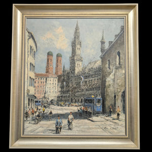 Framed painting of Marienplatz, Munich, featuring the Neues Rathaus and Frauenkirche, with a street scene including people, trams, and buildings.