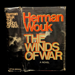The image shows the cover of 'The Winds of War' by Herman Wouk. The book is old with visible wear and tear, and the title is displayed in red and yellow lettering against a dark background.