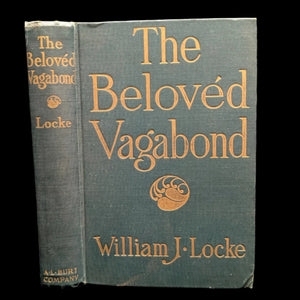 Cover of the book 'The Beloved Vagabond' by William J. Locke, featuring title and author's name in a classic typeface, with a small decorative element on the side.