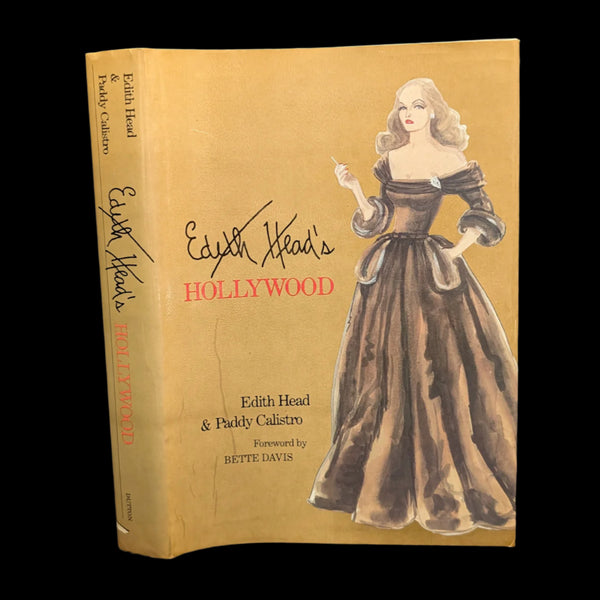 A book cover of 'Edith Head’s Hollywood' featuring an illustration of Edith Head wearing a vintage style dress.